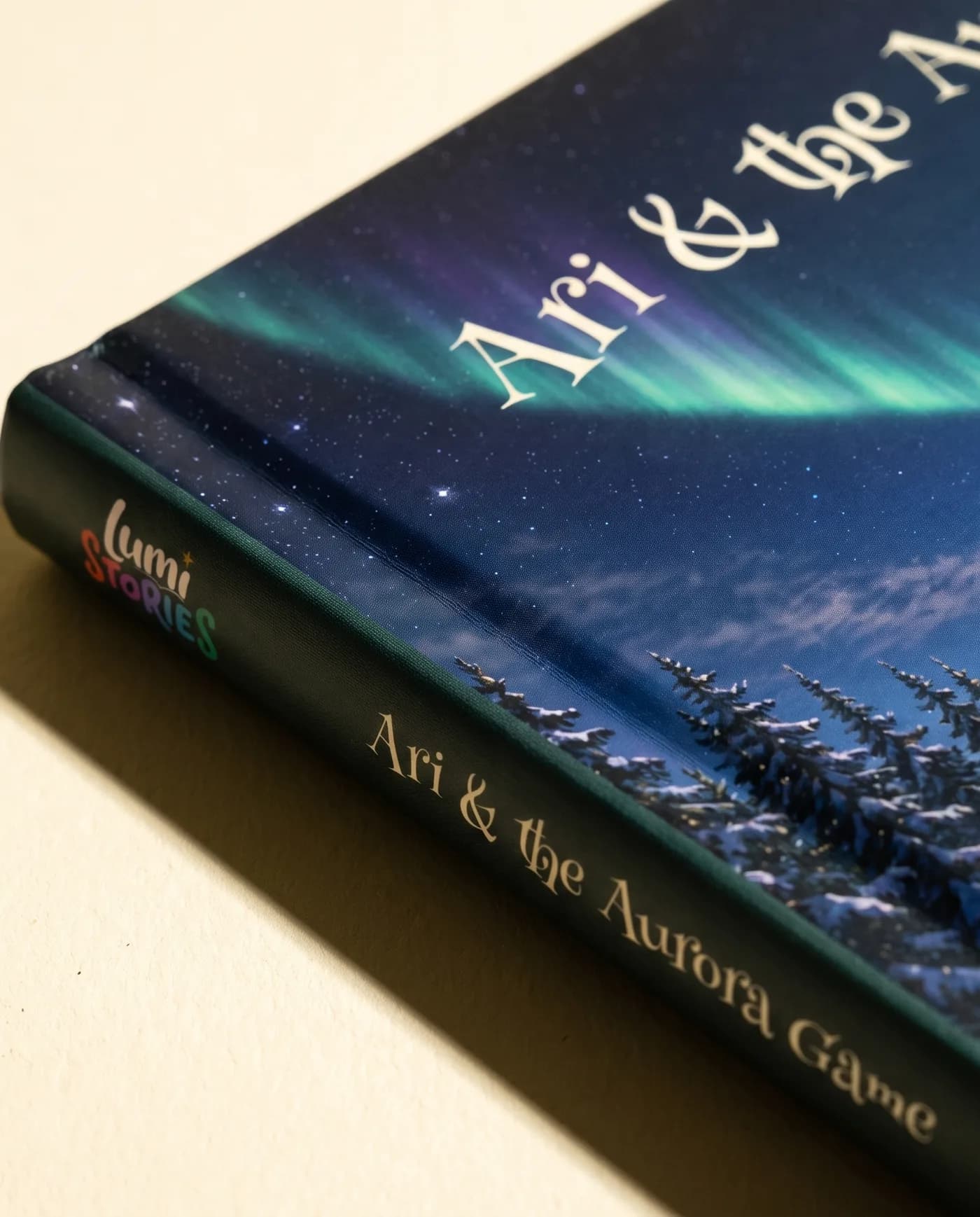 Close-up of the hardcover: the spine hinge, the board edge and the matte cover art